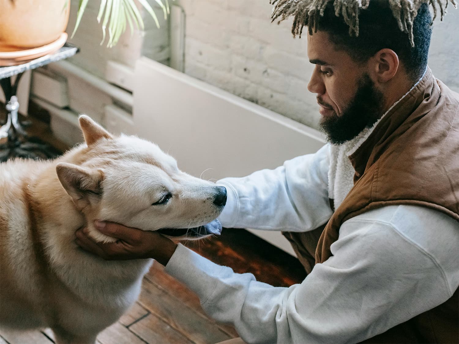 man getting ready to leave dog alone
